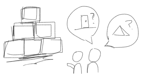 An image of two people looking at blocks resembling the pyramids!